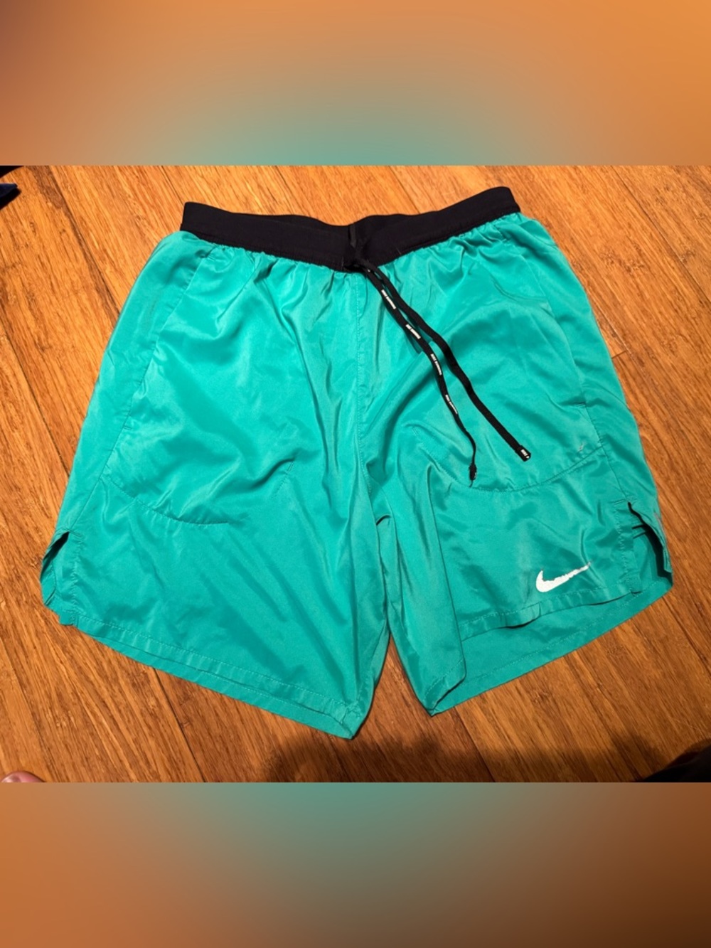 Nike 7” Stride Men’s Teal Athletic Shorts with Black Waistband